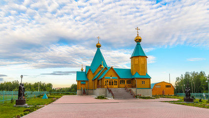 Fototapeta premium Wooden Orthodox church New Martyrs and Confessors Russian before painting. Apatity, Murmansk region, Russia.