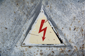high voltage sign on metal сabinet
