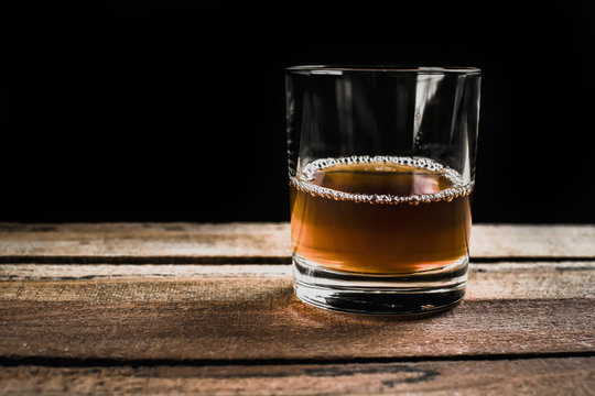 Whiskey on wooden surface