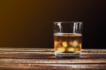 Whiskey on wooden surface
