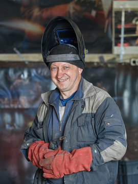 The smile of a welder.