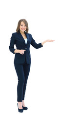 Happy  young beautiful business woman showing blank area for sig