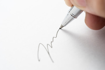 Sign Signature on White Paper Close up shot
