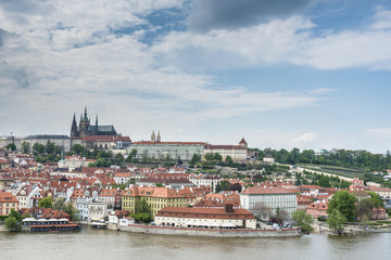 Fototapeta na wymiar Prague Castle and Saint Vitus Cathedral under the river Vltava. Panoramic view of the Old Town of Prague. Czech Republic