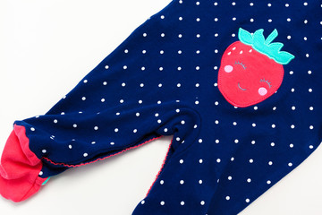 Obraz premium clothes for newborn on table