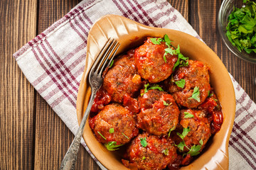 Pork meatballs with spicy tomato sauce in dish