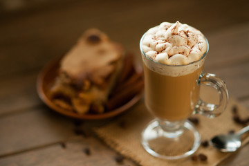 Glass of cup coffee with cream 