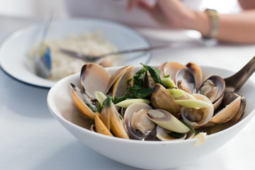 Fried stir spicy sea food for eat on table.