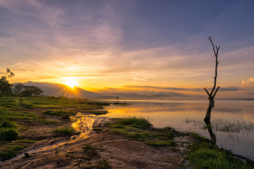 Fototapeta na wymiar Landscape of the lake in sunrise scence