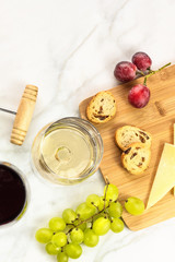 Glasses of red and white wine at tasting