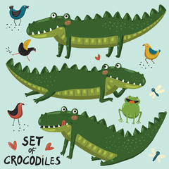 Naklejka premium Set of three cute crocodiles, birs, dragonflyes, frog and heart hand-draw in cartoon style on blue background. Vector children illustration.