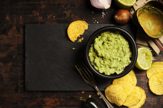 Mexican nachos chips with fresh guacomole sauce