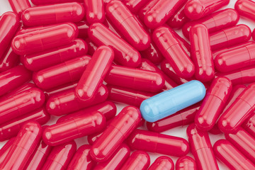 Many medicines red pills capsules of diferent color