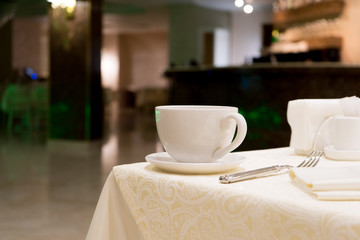 white Cup of coffee on the table