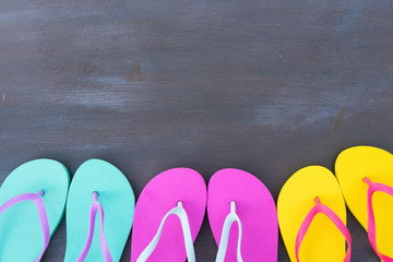 Summer beach fun - border of flip flop sandals