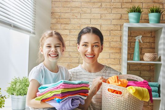 family doing laundry at home