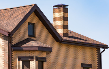 house with a gable roof window