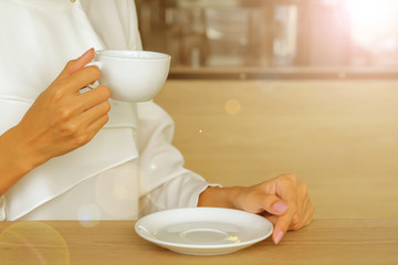 White  glass coffee in men's  hands