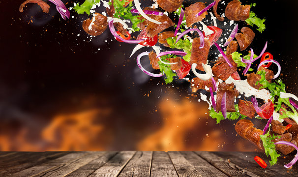 Kebab ingredients with flying ingredients.