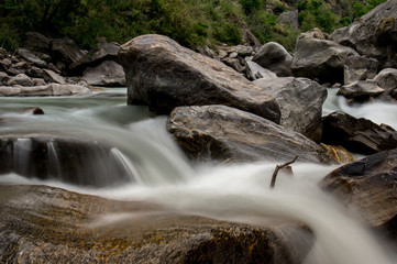 Fototapeta premium Blurred Motion of Water over Rocks