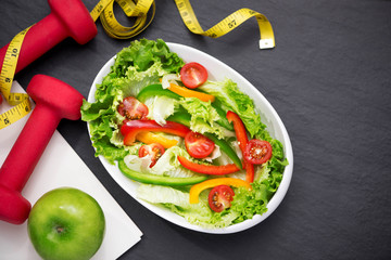 Healthy fitness meal with fresh salad. Diet concept.