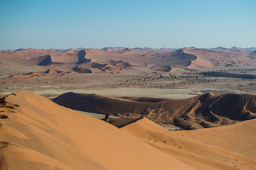 Fototapeta na wymiar Climbing Big Daddy Dune, View onto Desert Landscape, Sossusvlei, Namibia