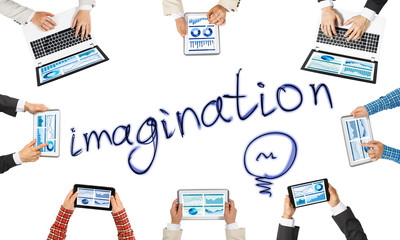 Top view of businesspeople sitting at table and using gadgets