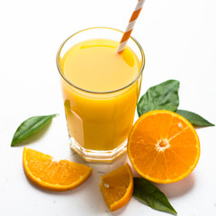 Obraz na płótnie Canvas Orange juice in glass on white.
