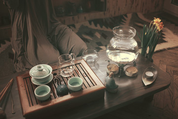 young beautiful blonde woman making tea ceremony