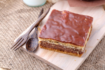 Millefeuille Chocolat on wood background