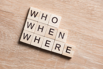 Conceptual business keywords on table with elements of game making crossword