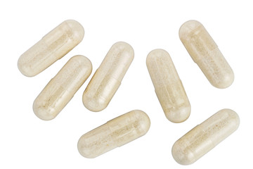 Capsules of glucosamine chondroitin, healthy supplement pills isolated on white background, top view