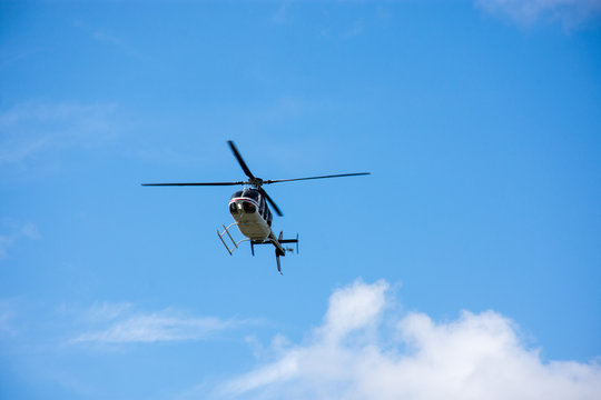 Helicopter flying the blue sky