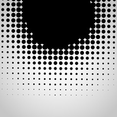 Halftone abstract black dots design element isolated on a white background.