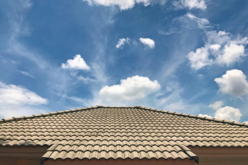 Fototapeta na wymiar Roof tiles with blue sky