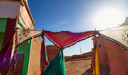 Multicolored scarves on display in Moroccan market