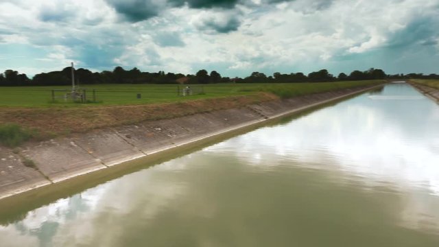 timelapse of  panoramic view of irrigation chanel in Italy