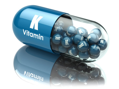 Vitamin K capsule or pill. Dietary supplements.
