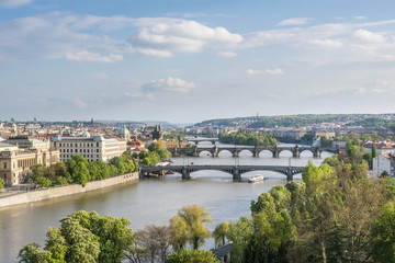 Naklejka premium View of bridges on the Vltava river and historical center of Prague, Czech Republic
