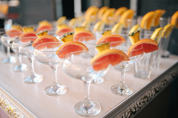 Rows of empty glasses prepared for reception