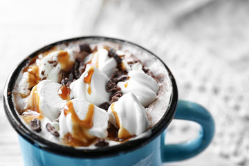 Cup of hot cocoa with marshmallows, closeup