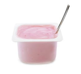 Plastic cup with yogurt and spoon on white background