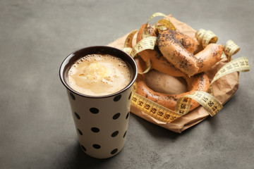Composition with tasty butter coffee on grey table