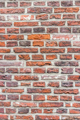 Old brick wall for background. Red and orange bricks