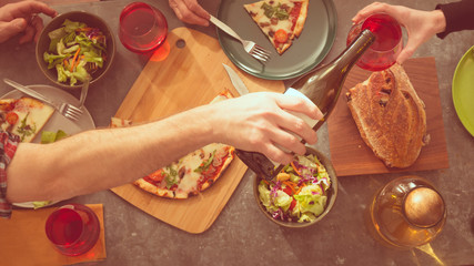 Friendly family dinner party preparation