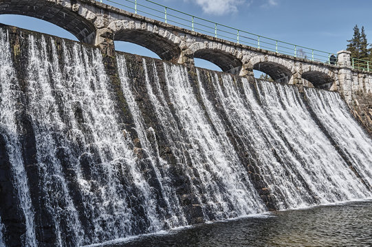 The dam and waterfall on the river Lomnica in Karpacz.