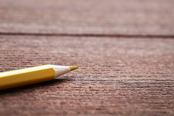Drawing colourful pencil on brown wooden table