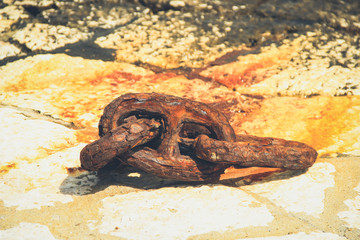 Rusty chain in a pier