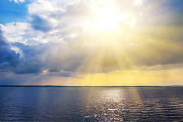 dramatic sunset above a big lake