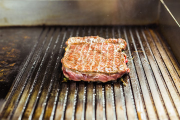 closeup of a steak on grill